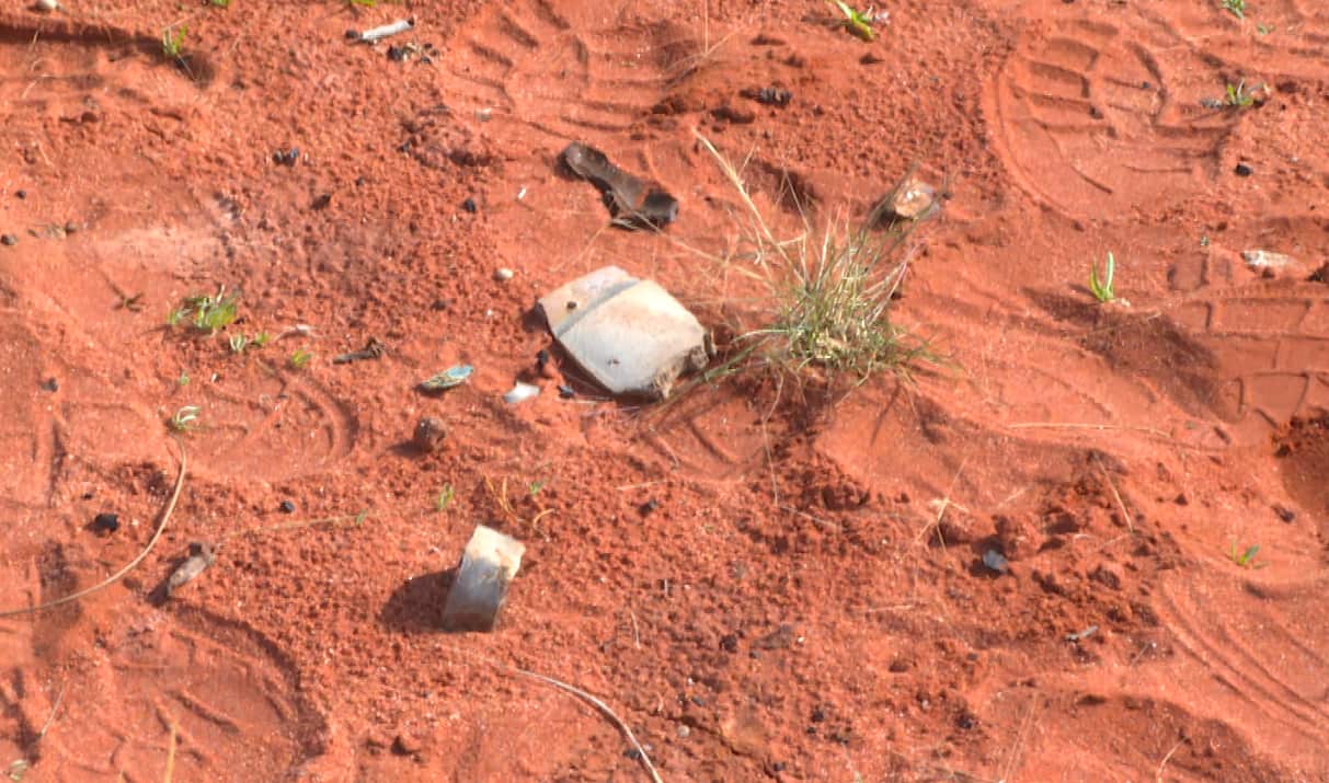 Bomb fragments in red sand near Woomera in South Australian