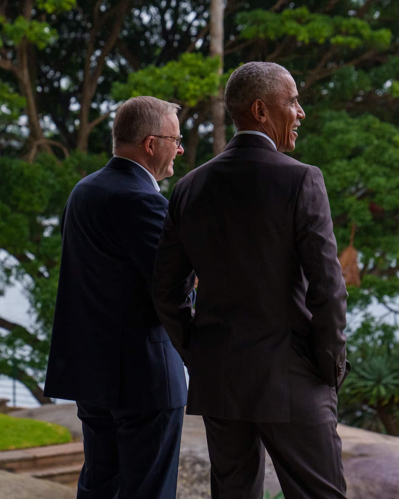 Prime Minister Anthony Albanese and Barack Obama from behind.