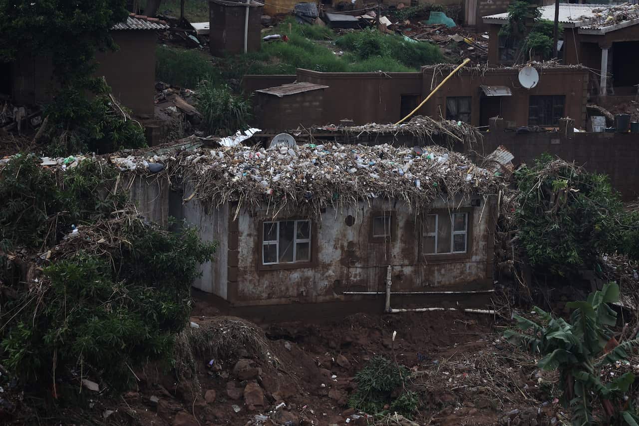 A flood damaged home near Durban in South Africa.
