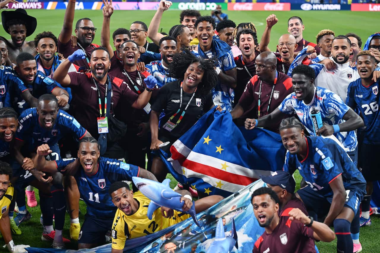 Cape Verdean players celebrating on a football pitch