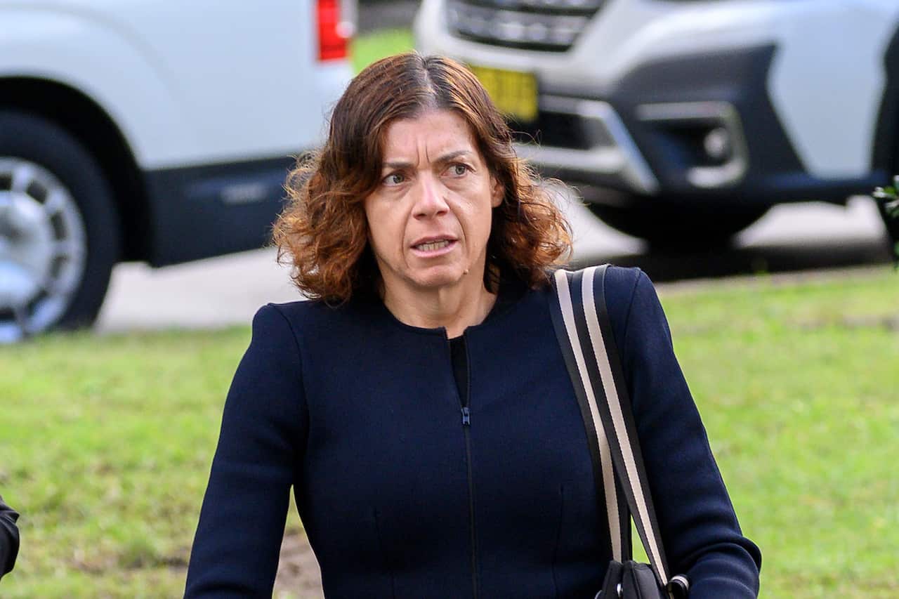 A woman walking outside.