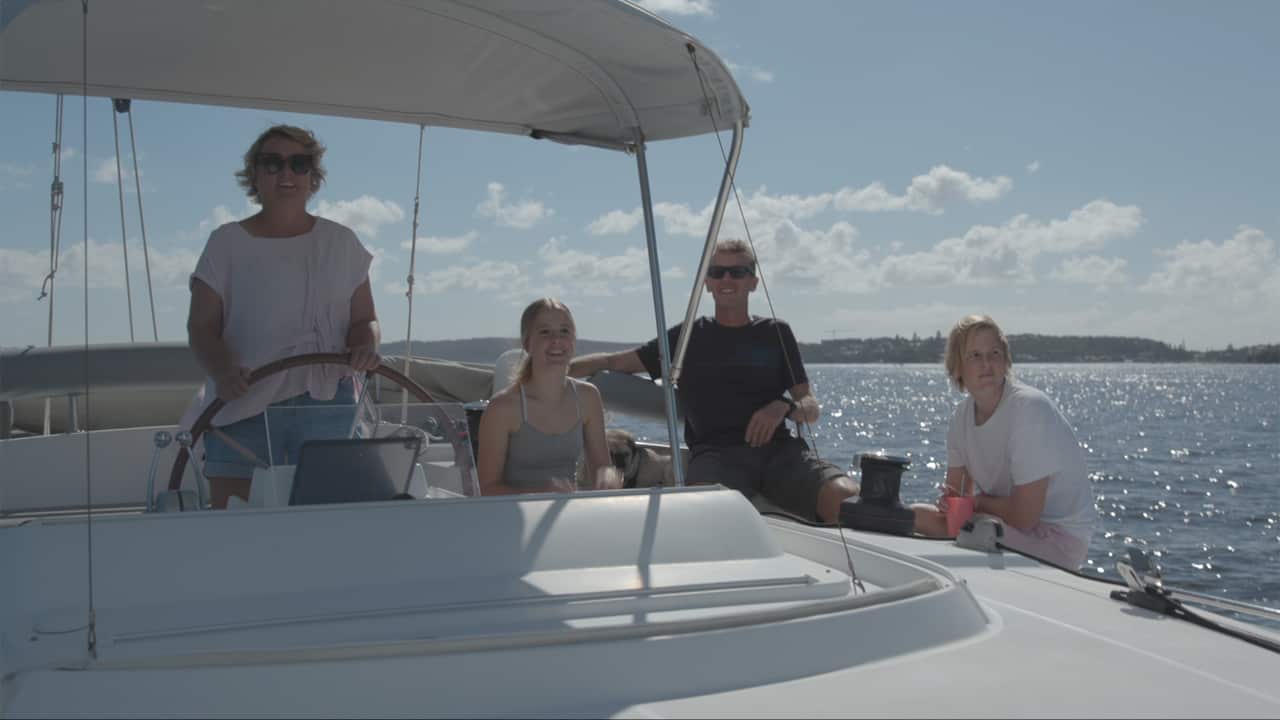 The Clark family in their boat about to sail up the east coast of Australia
