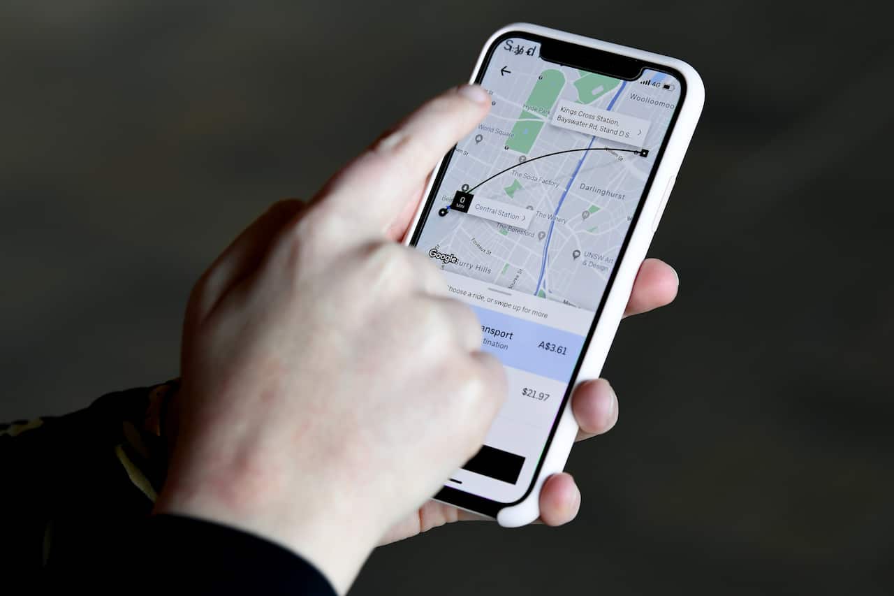 A smartphone screen showing transport options on the Uber app.