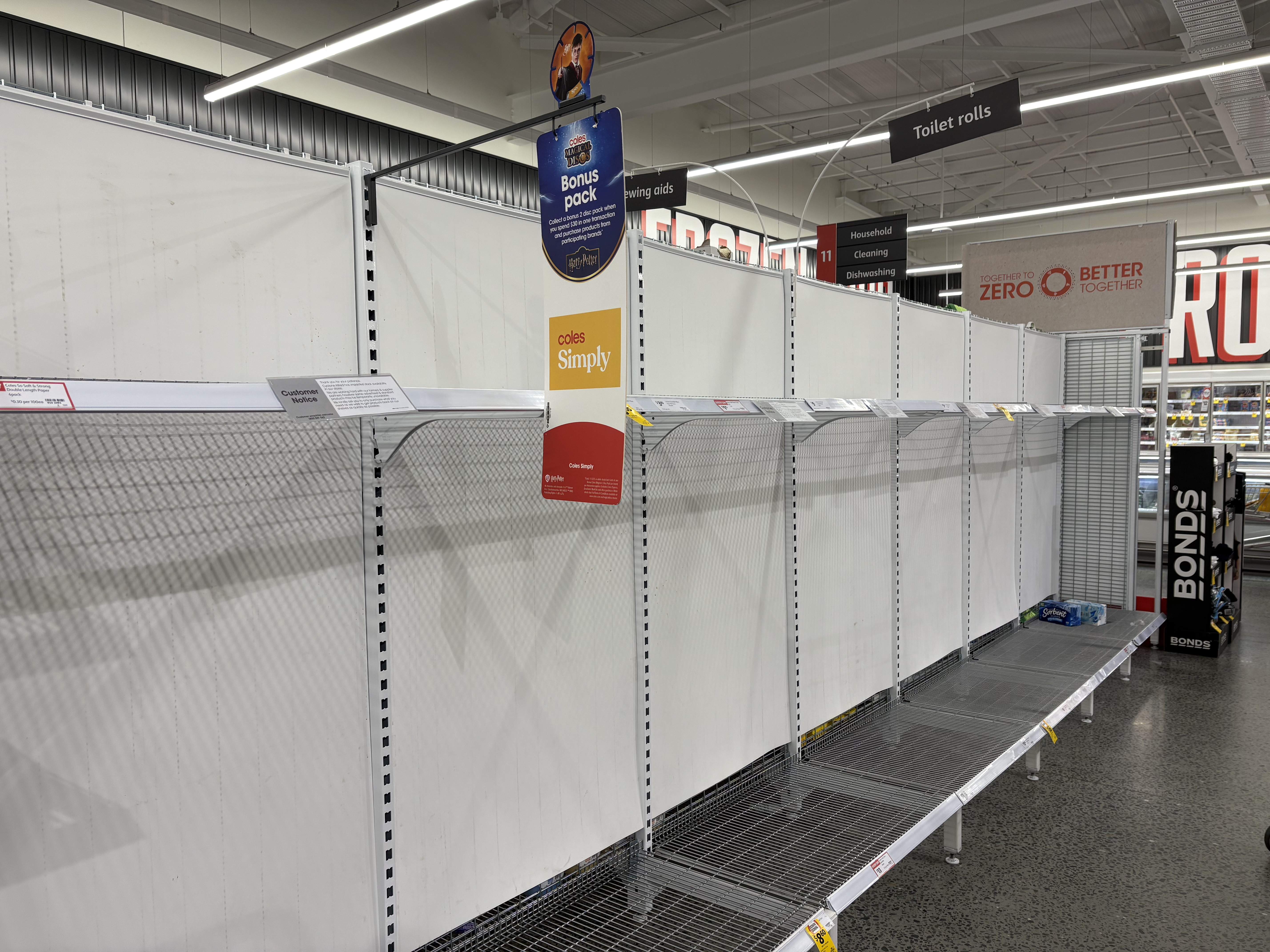 Empty supermarket shelves at a supermarket. 