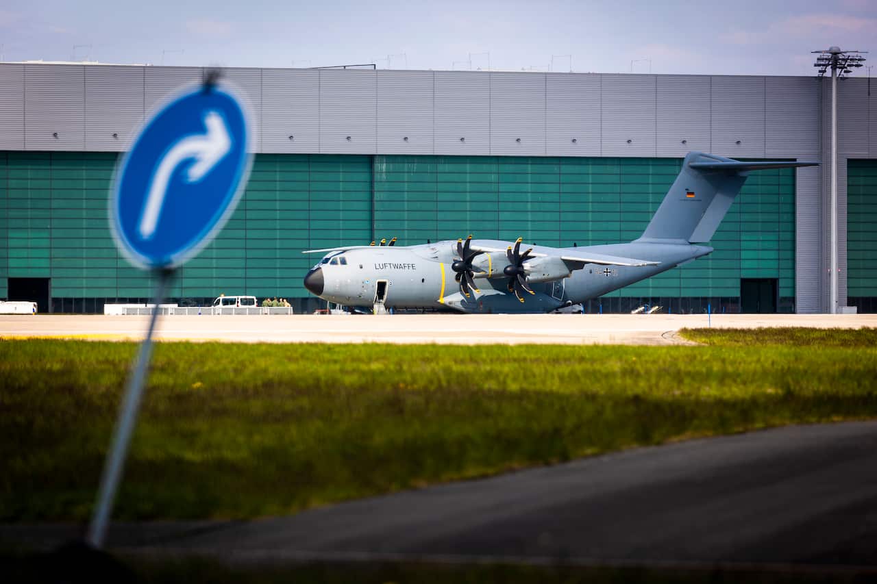 A German airbus sitting at Hanover airport after a cancelled evacuation attempt.