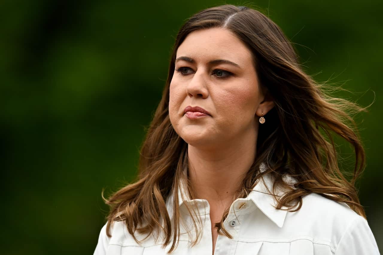 Brittany Higgins walking outside.