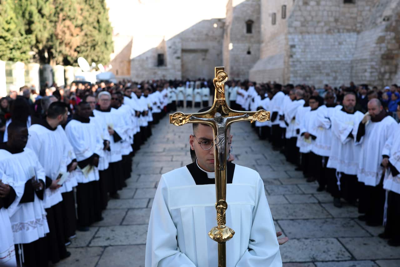 Christmas Eve procession in Manger Square in Bethlehem 
