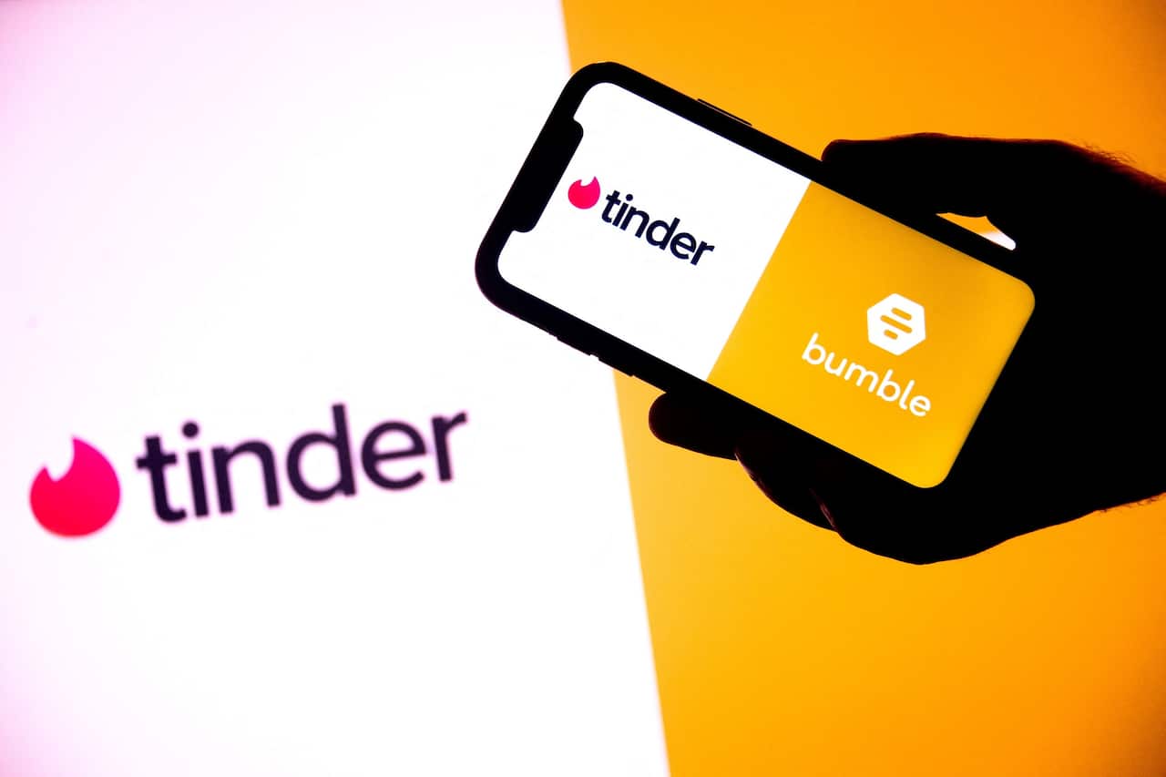 The logos of dating apps Tindr and Bumble.