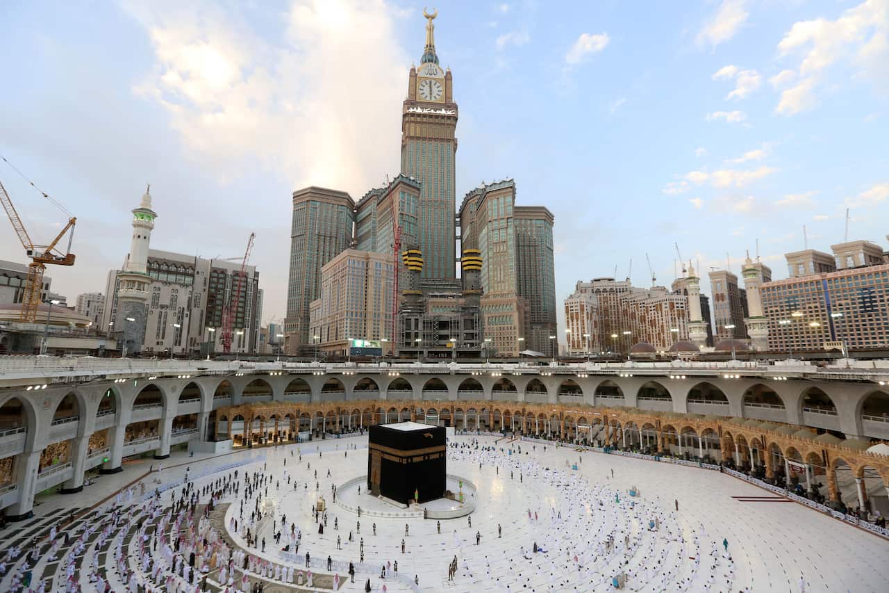 Muslim worshippers gather to pray around the Kaaba, the holiest shrine in the Grand Mosque complex in Saudi Arabia's holy city of Mecca, to mark the end of the fasting month of Ramadan.