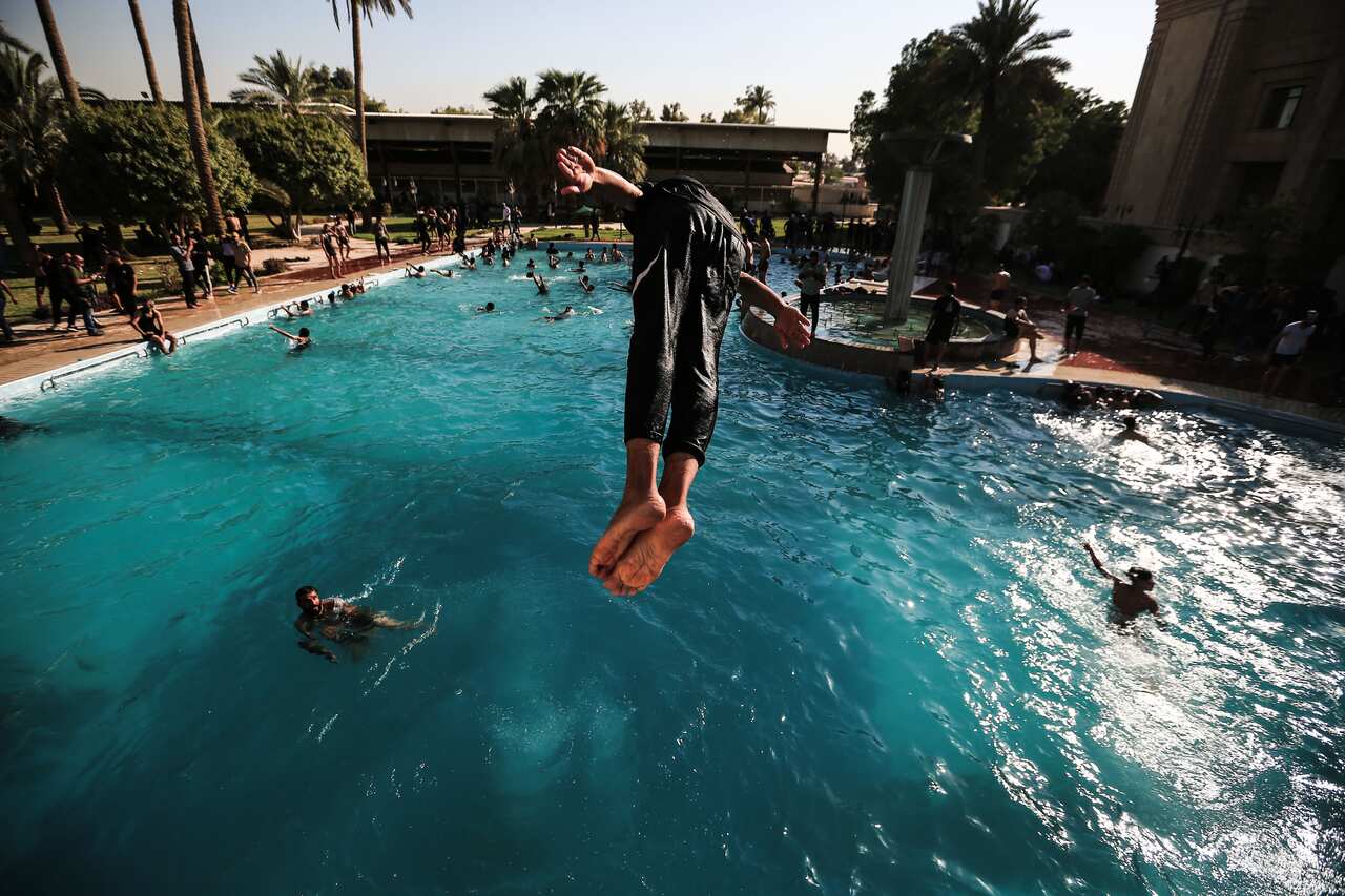 Followers of Mr al-Sadr headed to the building shortly after the Shiite cleric said he would retire from politics.