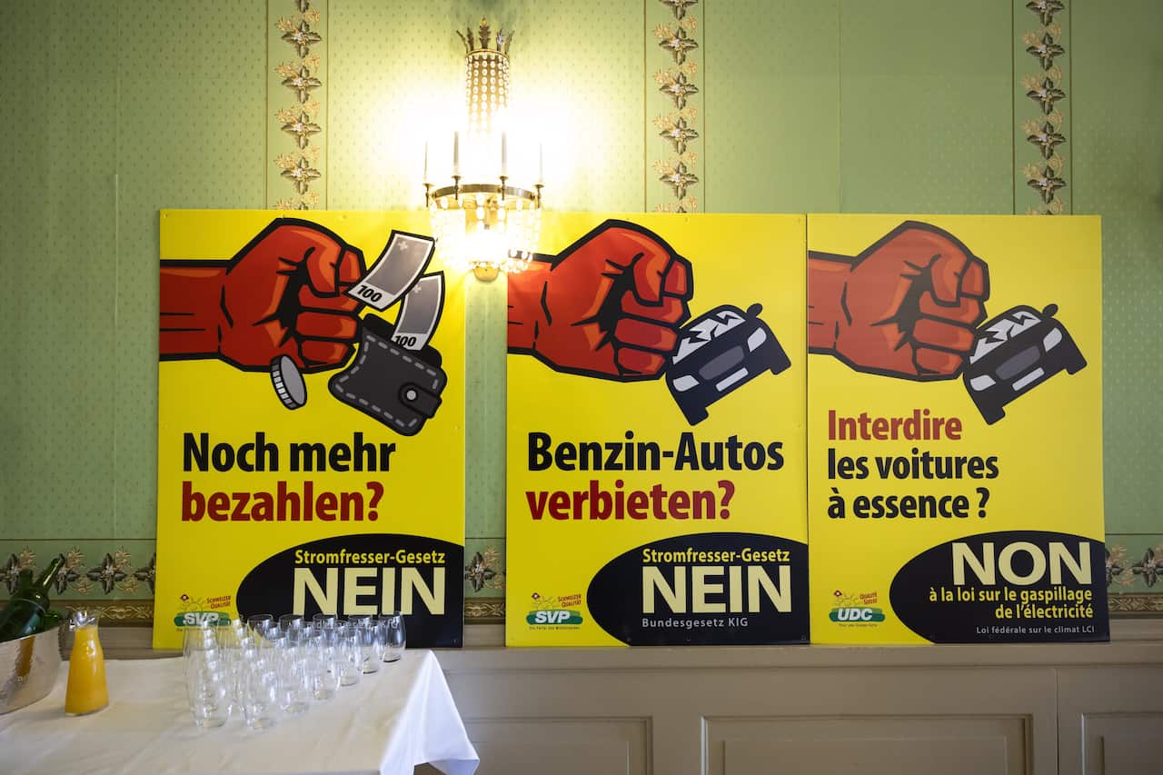 3 Yellow posters, two with German script and one with French