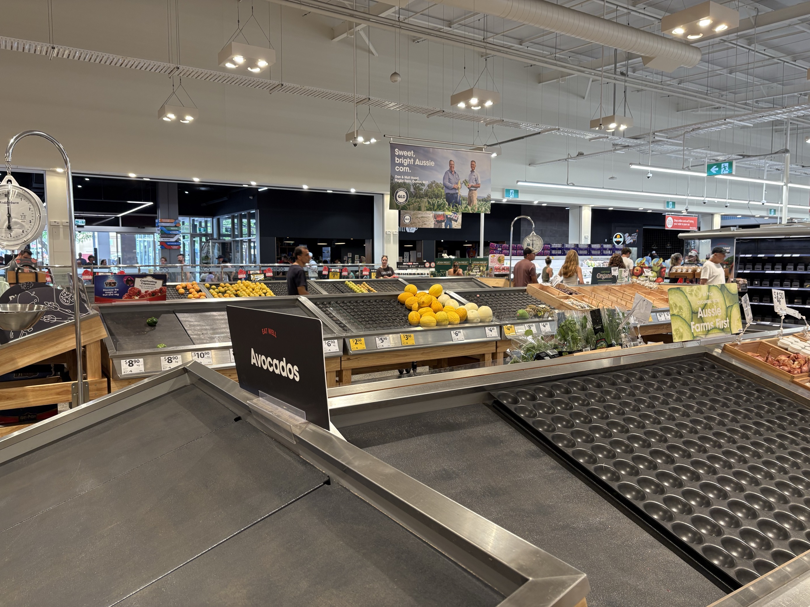 Empty produce shelves in a supermarket.