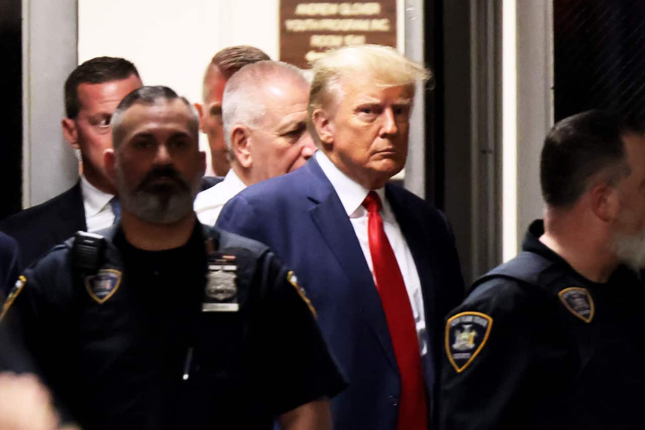 Former U.S. President Donald Trump arrives for his arraignment at Manhattan Criminal Court in New York City. 