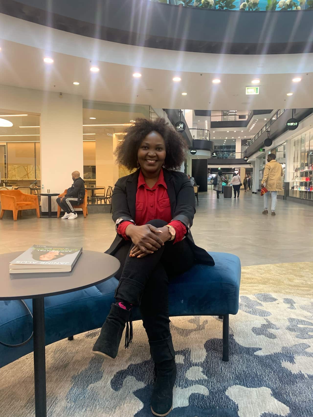 Catherine Jonathan sitting inside 