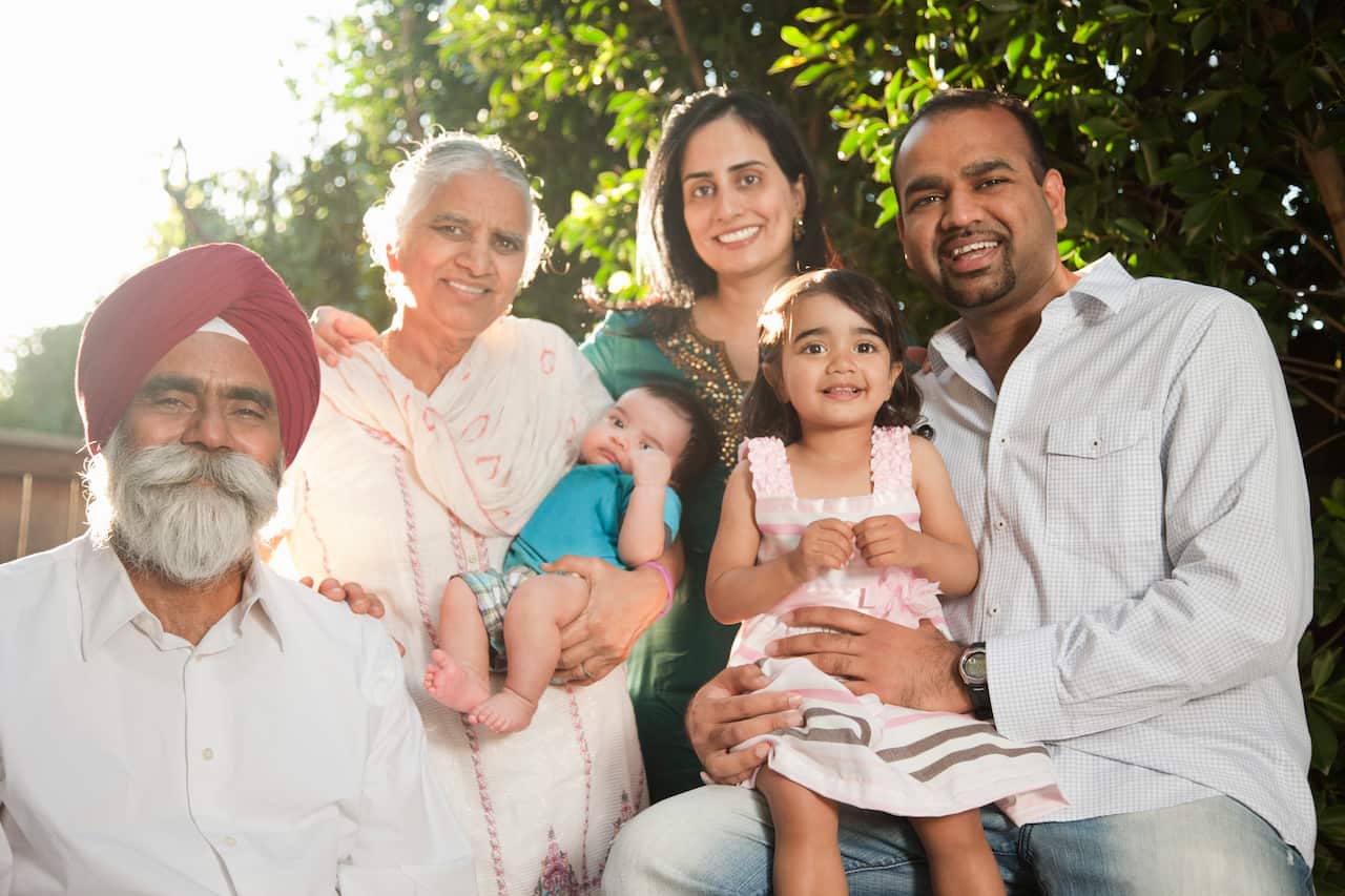 Smiling multi-generation Asian family