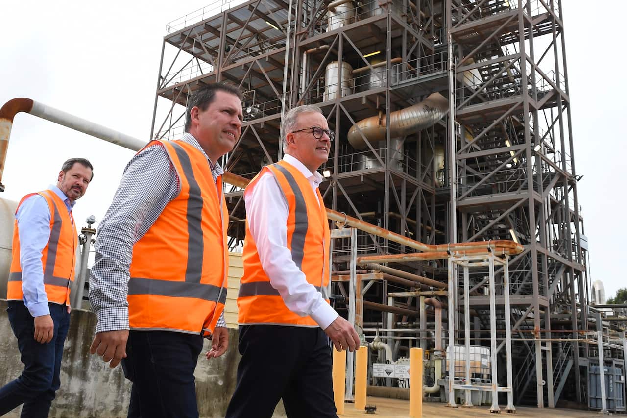 Opposition leader Anthony Albanese and Labor candidate for the seat of Flynn Matt Burnett arrive for a press conference after touring the Northern Oil Refinery in Gladstone on 12 May 2022.  