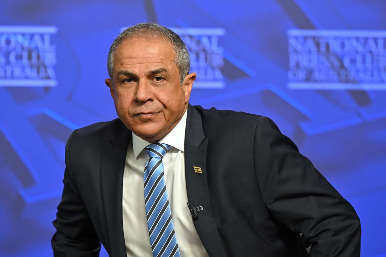 A man wearing a suit and tie