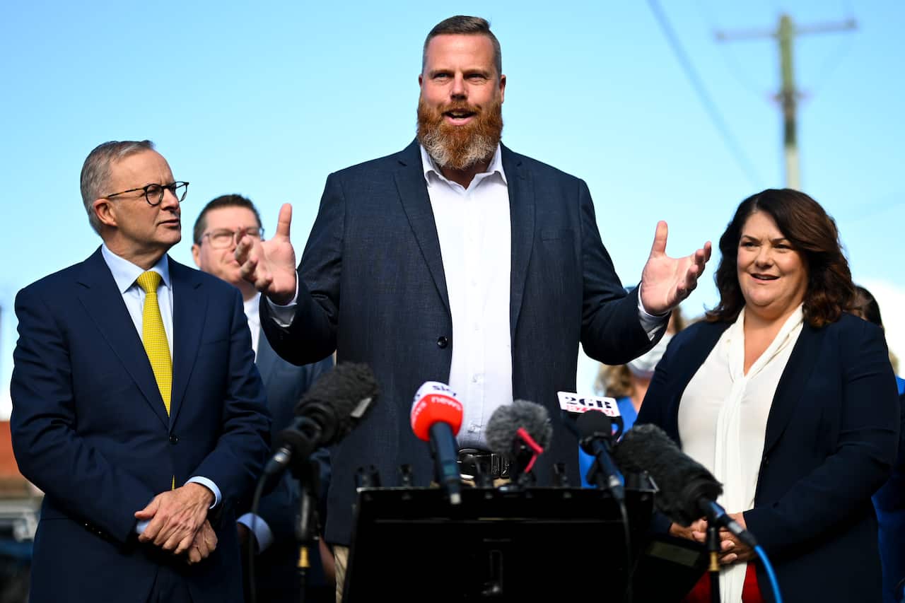 Dan Repacholi facing media speaking at press conference