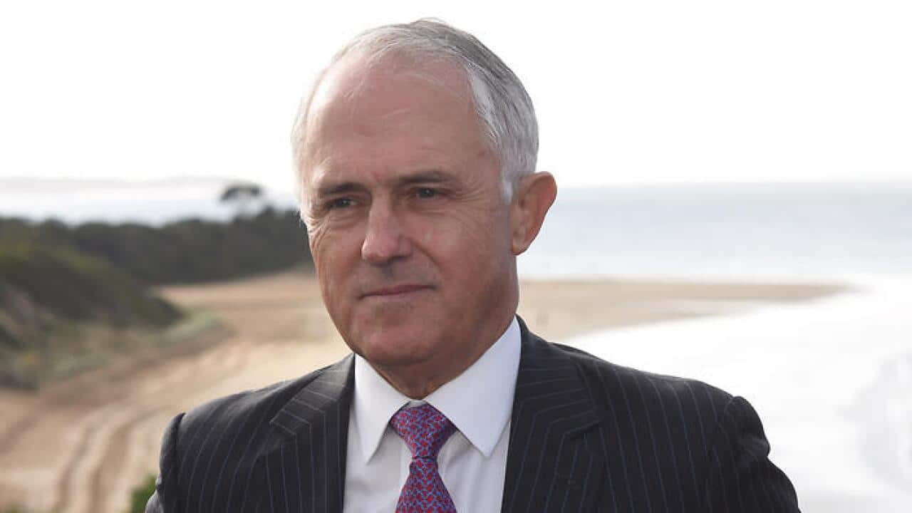 Australian Prime Minister Malcolm Turnbull speaks to members of the Anglesea Surf Live Saving Club near Geelong, Tuesday, May 24, 2016. M (AAP)
