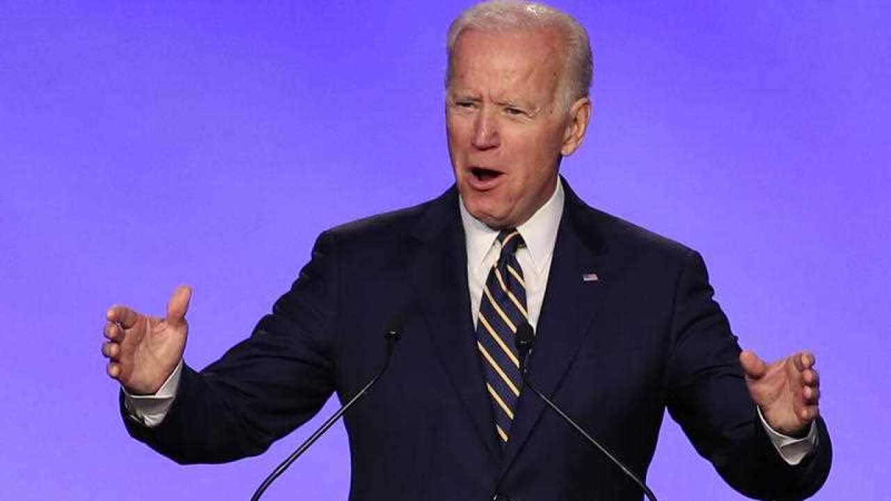 Democrat Joe Biden, who signalled Friday he was on the cusp of announcing a presidential bid, brushed off allegations of inappropriate conduct.