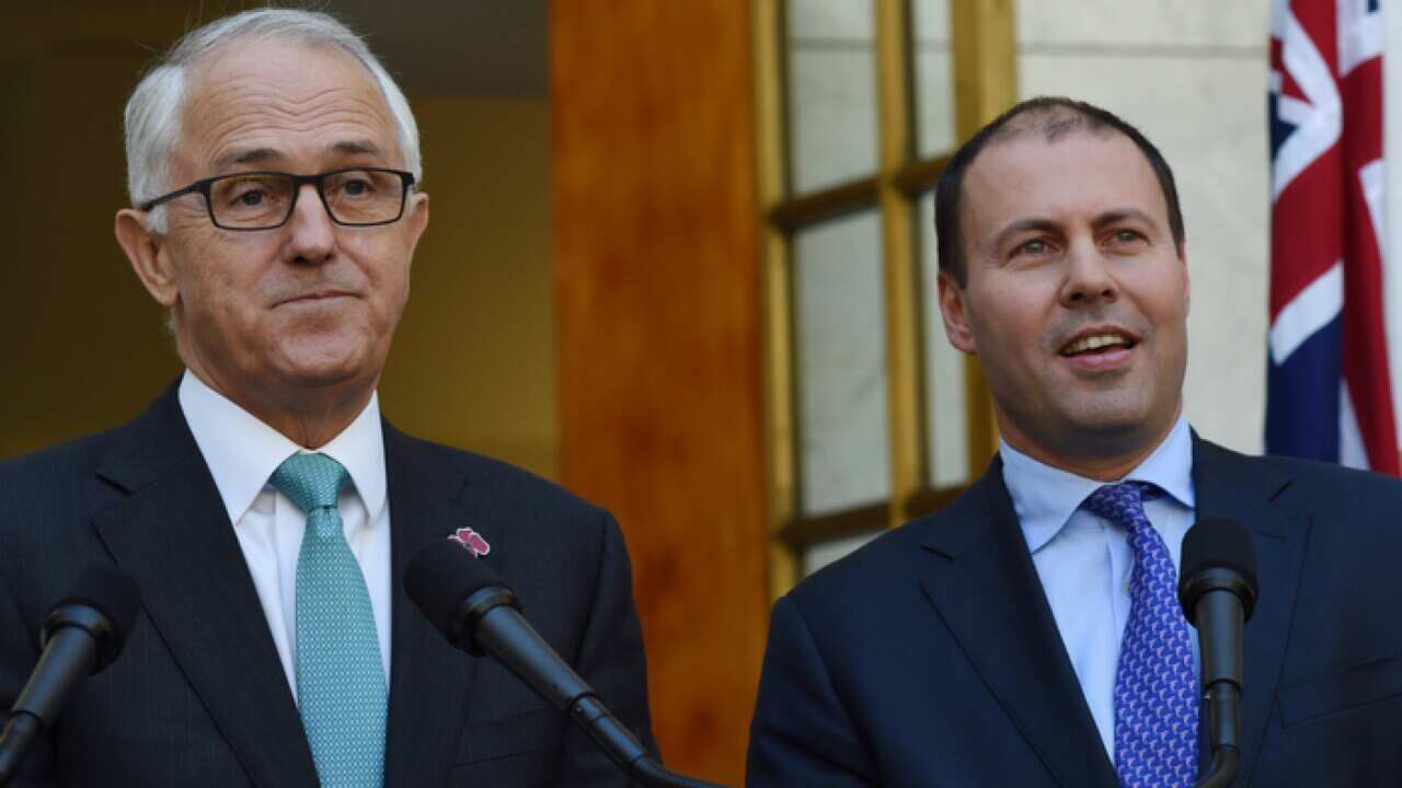 Australia's Prime Minister Malcolm Turnbull (left) and Australia's Environment Minister Josh Frydenberg speak to the media during a press conference at Parliament House in Canberra, Thursday, Nov. 10, 2016. (AAP Image/Lukas Coch) NO ARCHIVING