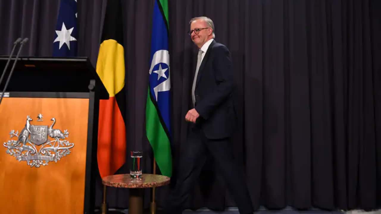 Anthony Albanese made his press conference debut as Prime Minister flanked by the Aboriginal and Torres Strait Islander flags.