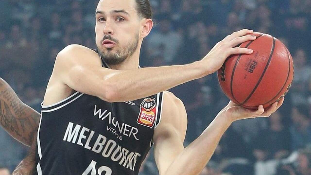 Chris Goulding of Melbourne under pressure.