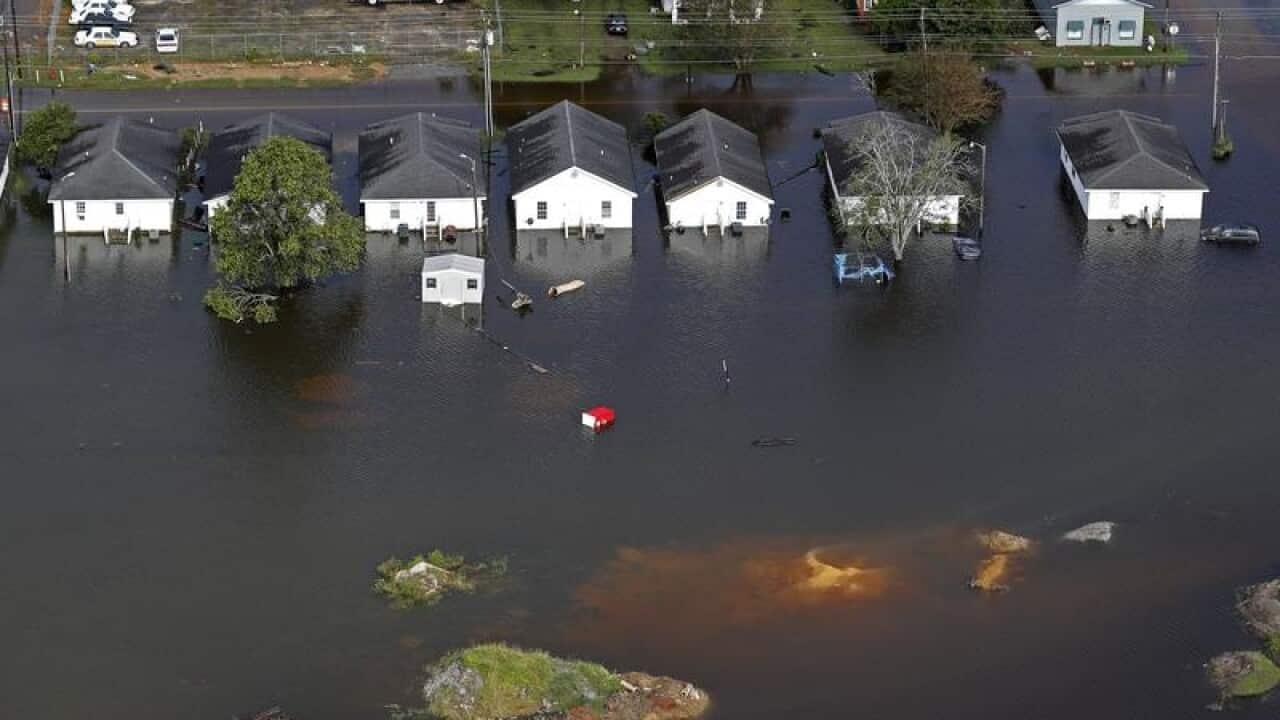 Floodwaters threaten homes in South Carolina