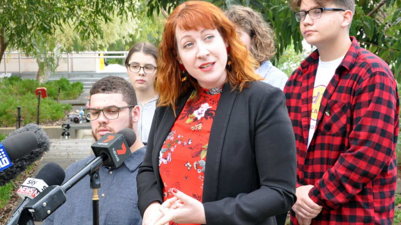 Australian Youth Affairs Coalition chair Katie Acheson (centre) alongside Greens Senator Jordon Steele-John(left) and Harry Sulley in Perth, 2018.