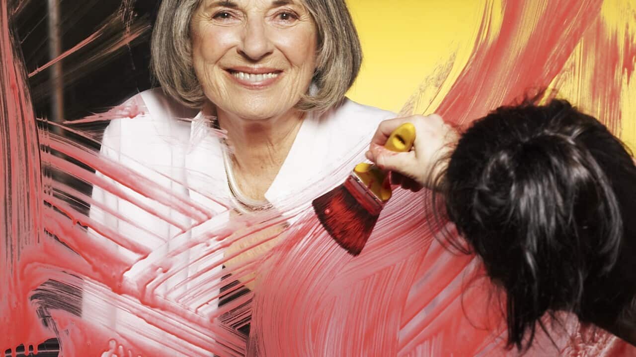 Betty Churcher behind the scenes in the gallery