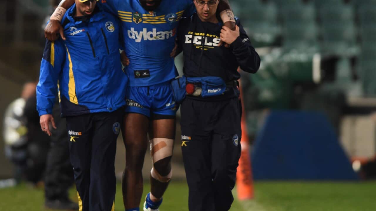 Semi Radradra of the Eels is helped from the field
