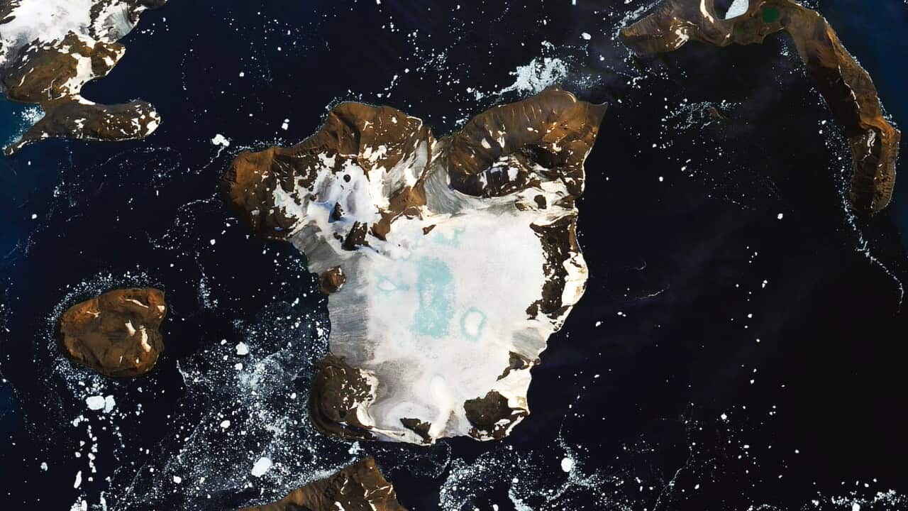 A handout picture made available by NASA of a satellite image showing melting on the ice cap of Eagle Island, off Graham Land, Antarctica.