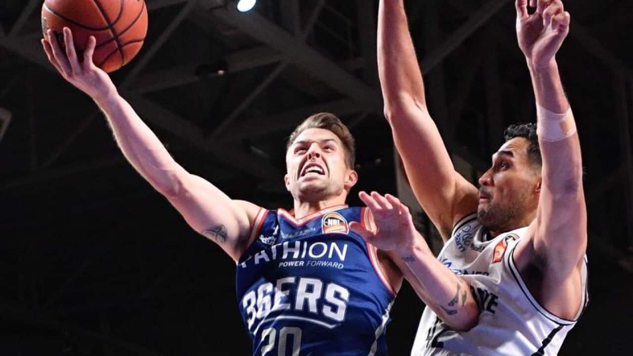 Adelaide 36ers Nathan Sobey in action with the ball against Melbourne.