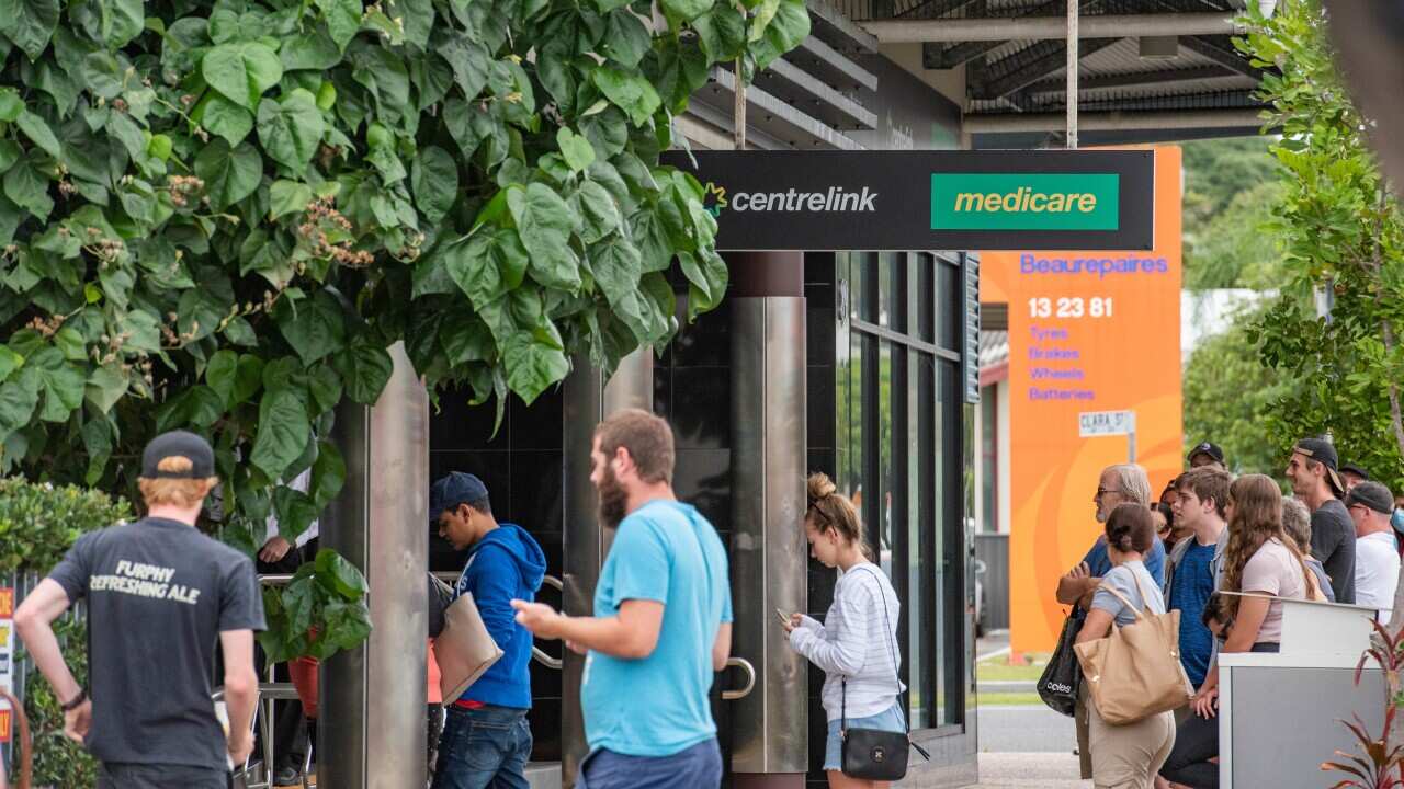 Australians queue at Centrelink during covid-19 pandemic