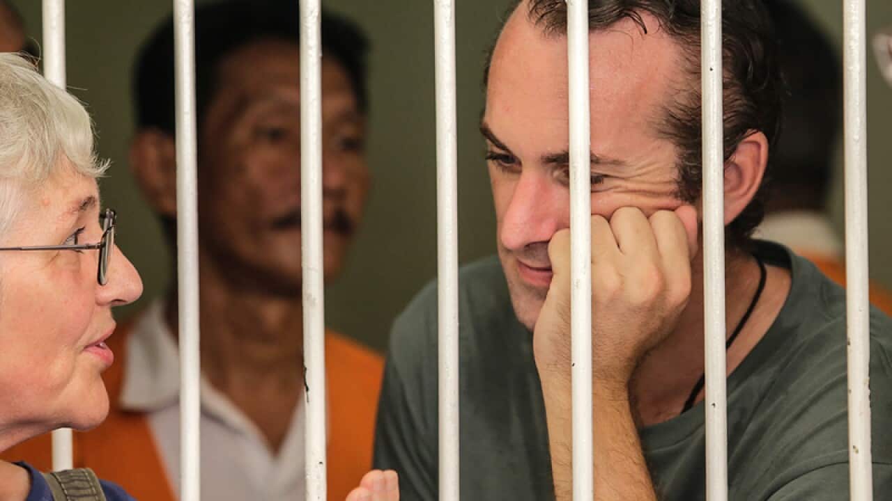 British man David Taylor talks to his parents in Denpasar
