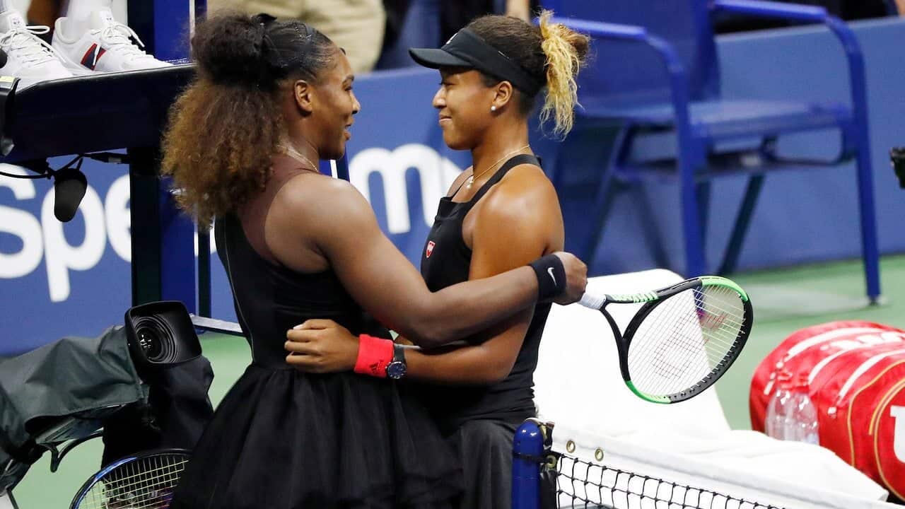 Naomi Osaka of Japan and Serena Williams of the US at the net after the US Open women's final.