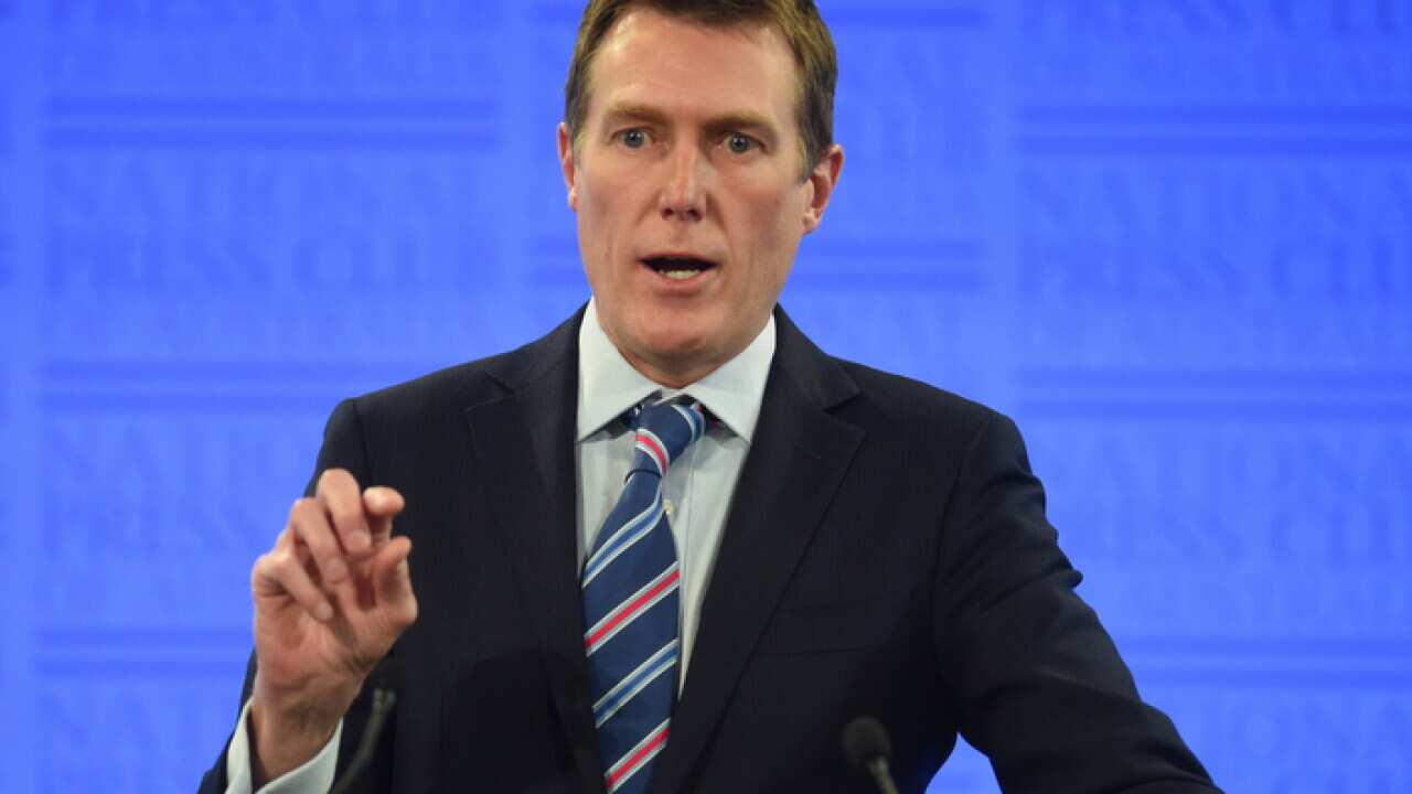 Australian Social Services Minister Christian Porter addresses the National Press Club in Canberra, Tuesday, Sept 20, 2016.