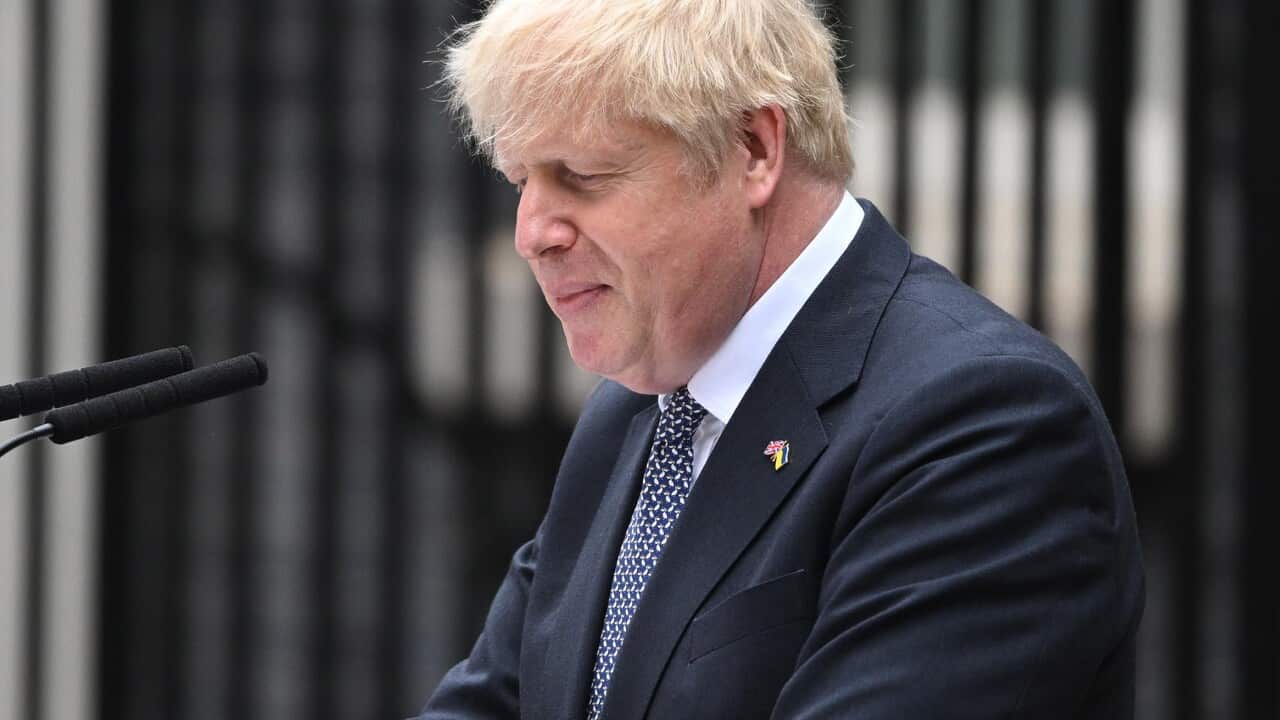 Boris Johnson speaks on a podium