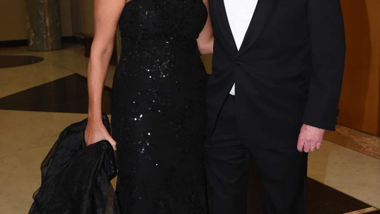 Peta Credlin and husband Brian Loughnane arrive for the Mid Winter Ball at Parliament House in Canberra, Wednesday, June 17, 2015. (AAP Image/Mick Tsikas) NO ARCHIVING