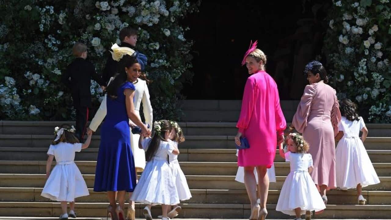 Bridesmaids and pageboys arrive for the royal wedding.