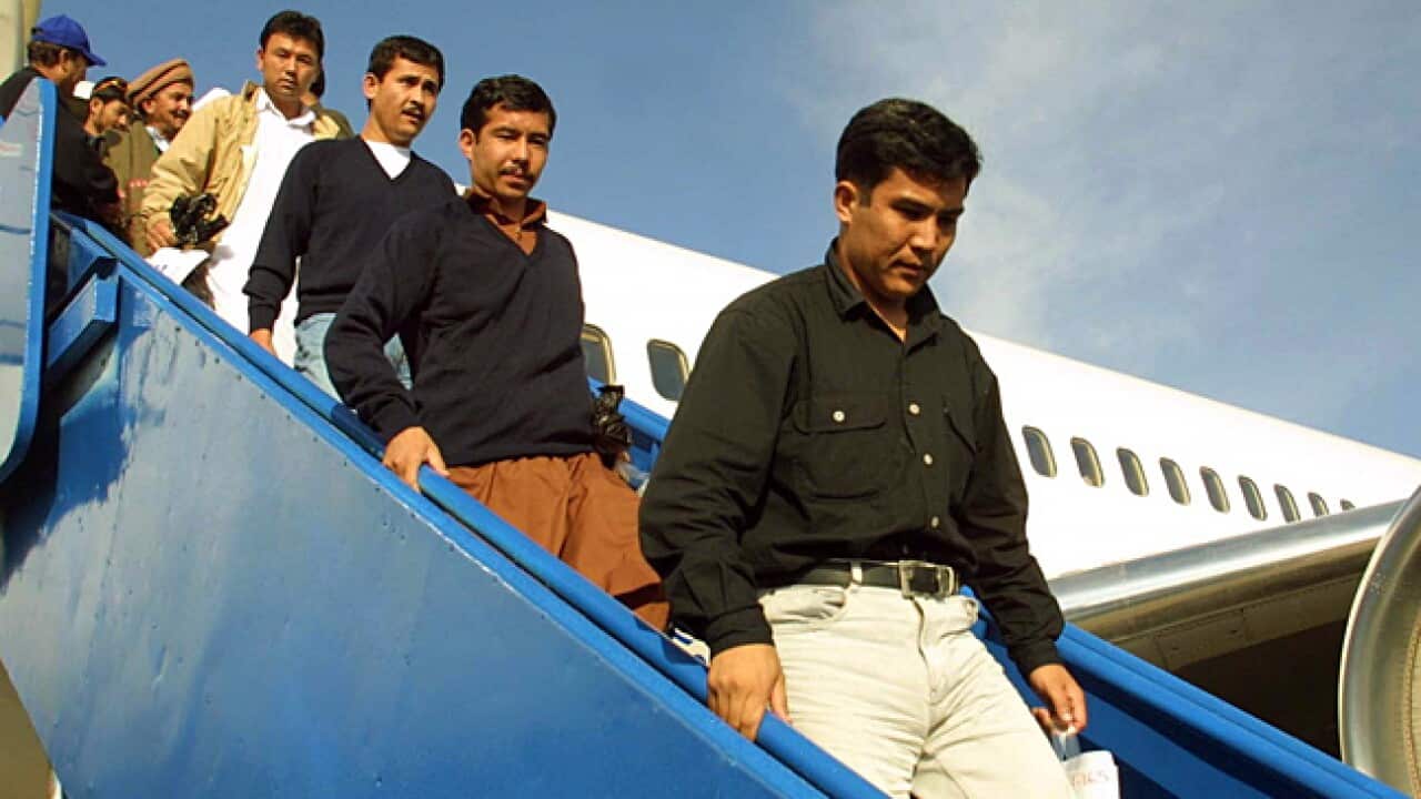 asylum_seekers_L_plane_afghan_120419_aap_139935877