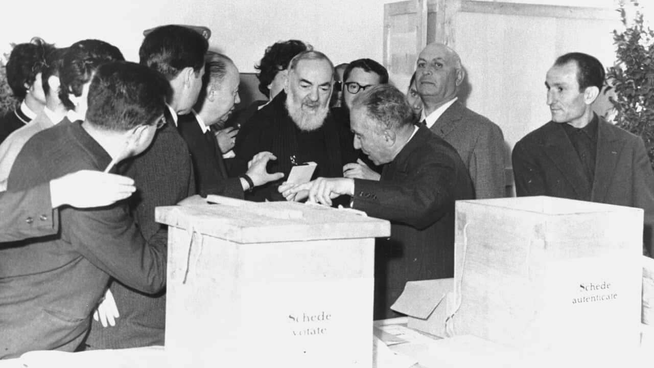 Padre Pio votes at the election of 1963