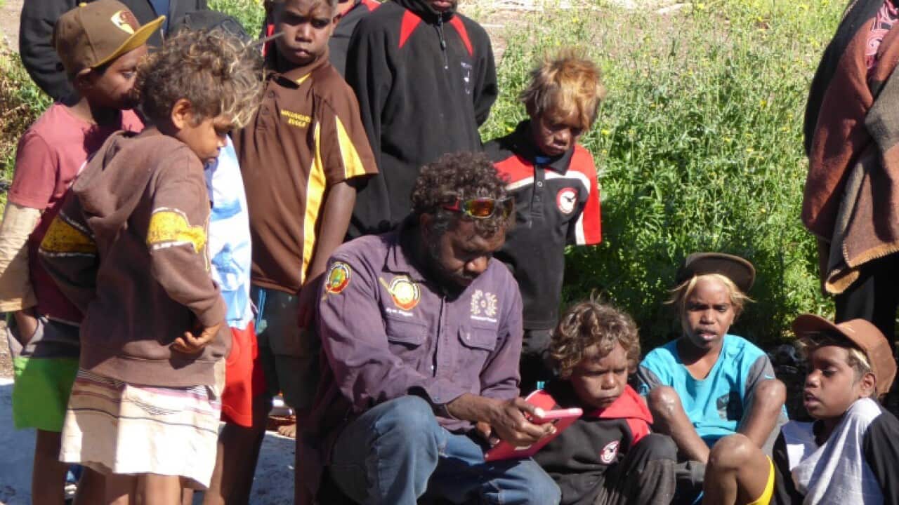 Indigenous students working on science project