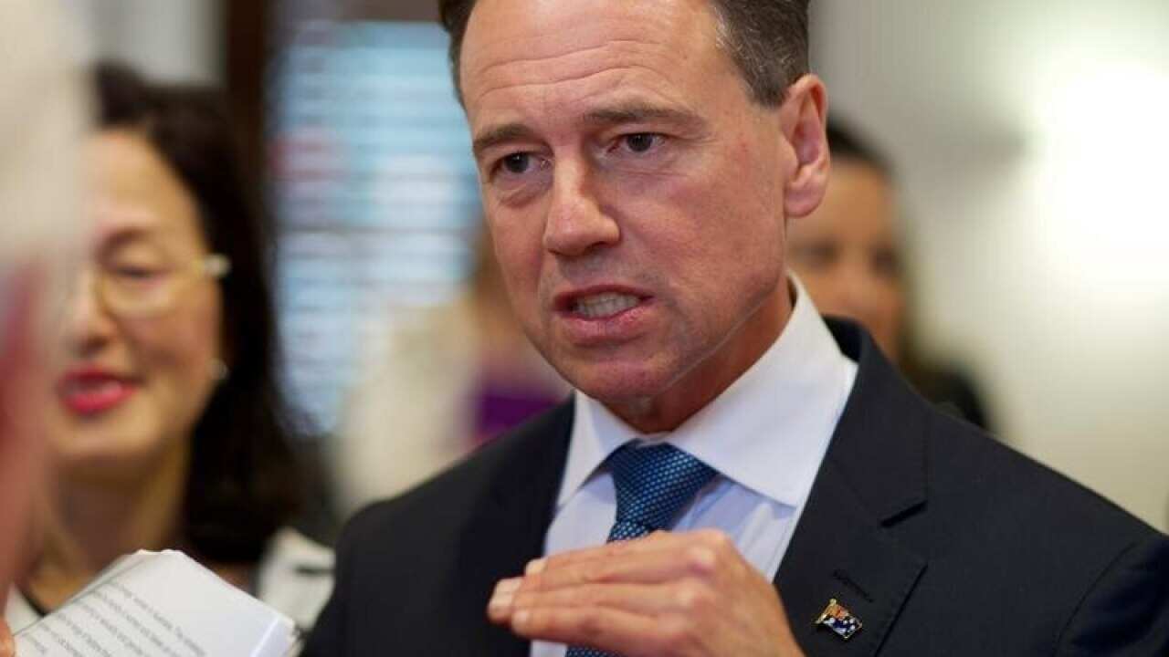 Health Minister Greg Hunt has issued a warning to medical specialists over "very excessive" fees.