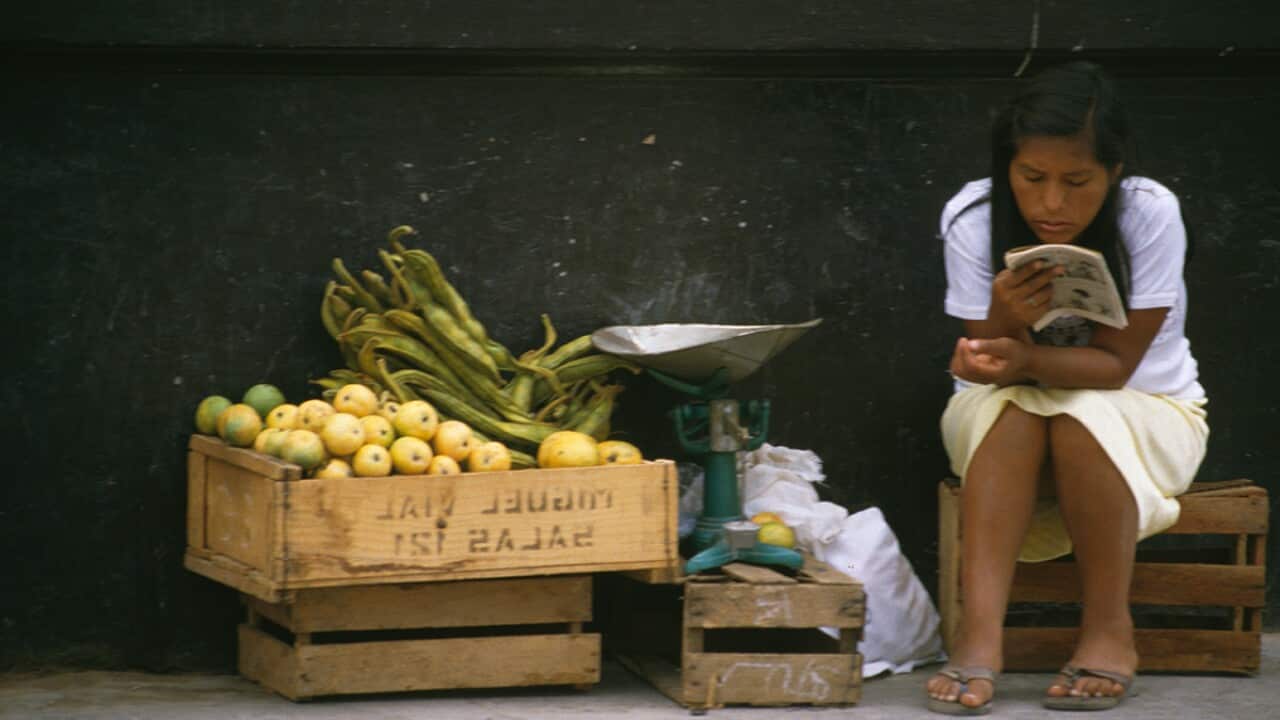 Girl reading in Peru