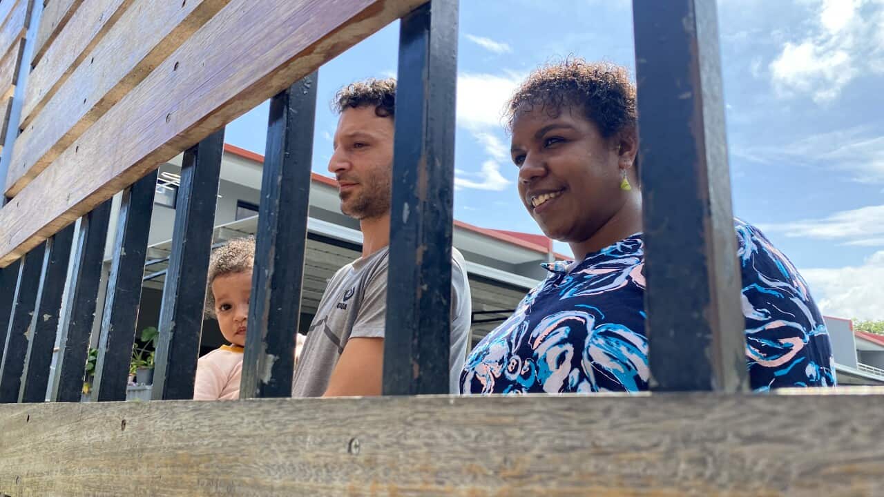 Image: Iranian Mehrdad, his wife from Papua New Guinea Marie and their daughter Mania (SBS)