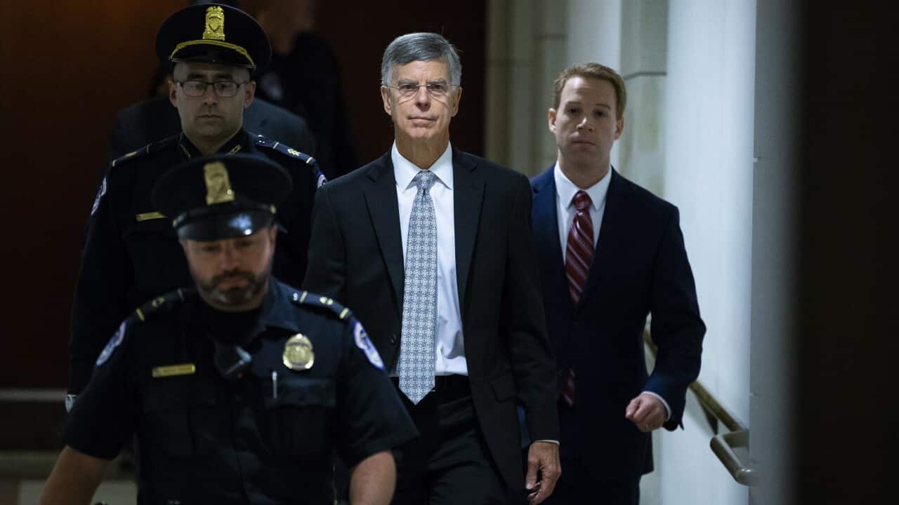 Charge d'Affaires at the US embassy in Ukraine Bill Taylor, centre.