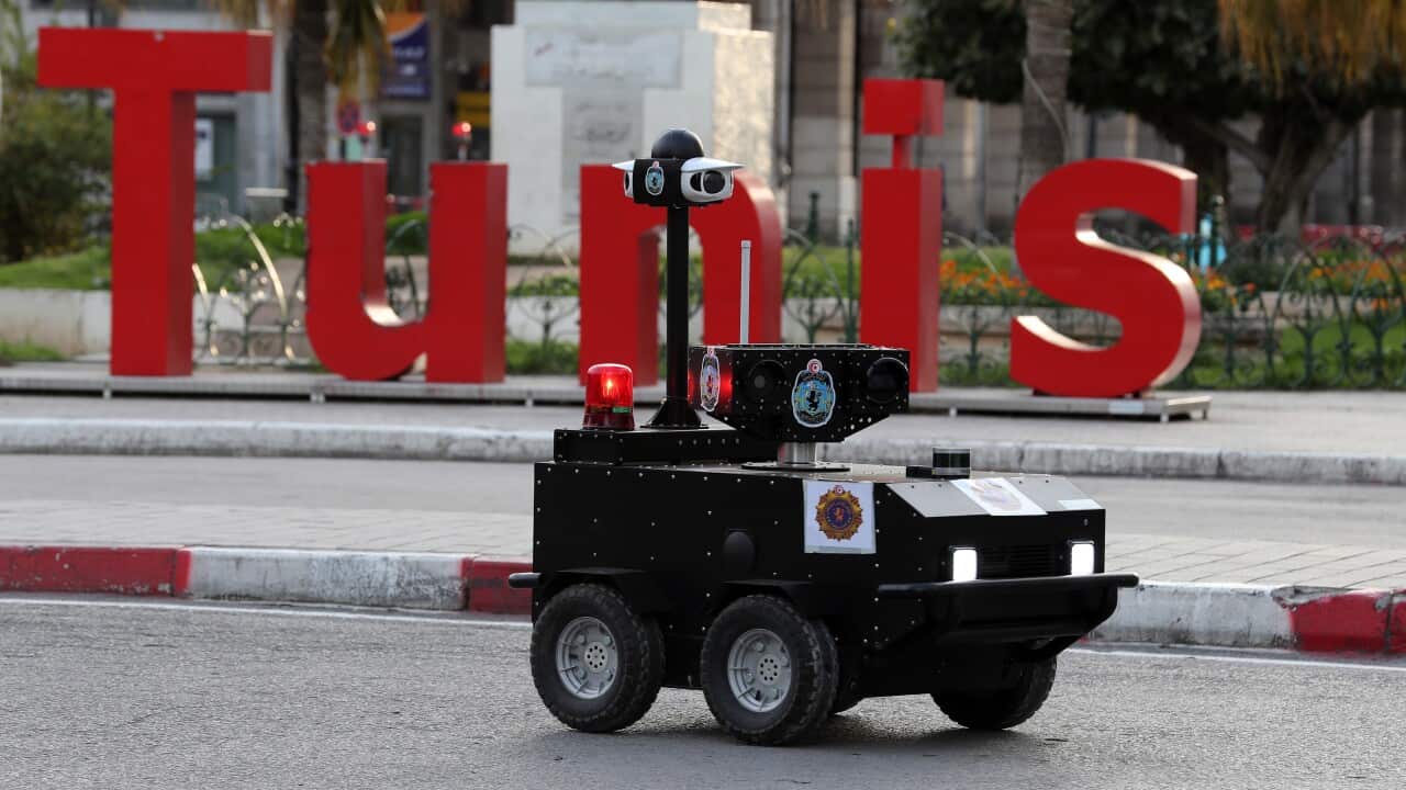 A Tunisian police robot patrols the empty streets of Tunis.
