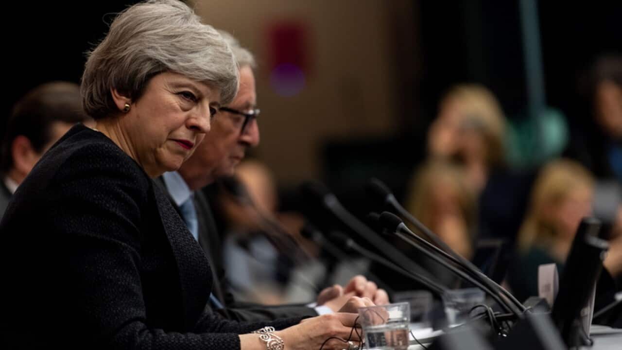 British PM Theresa May and EU President Jean-Claude Juncker announce their agreement in Strasbourg