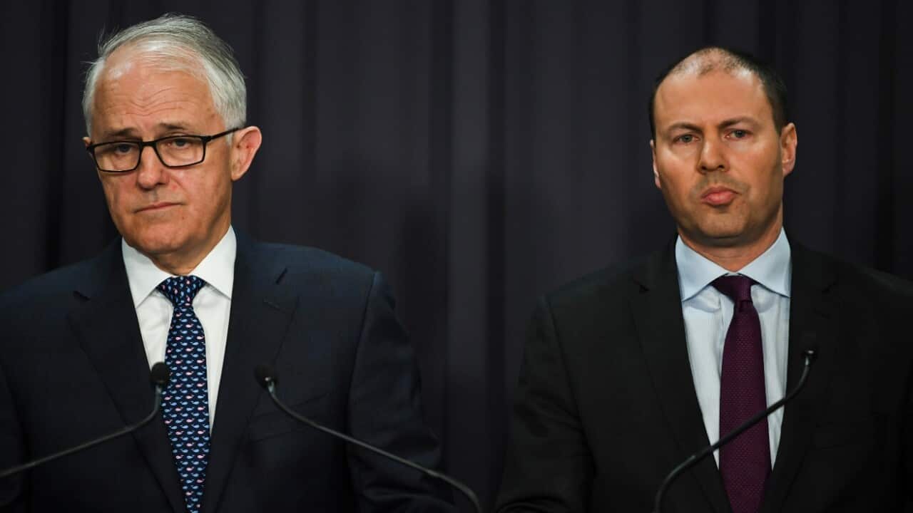 Australian Prime Minister Malcolm Turnbull and Australian Energy Minister Josh Frydenberg speak during a press conference at Parliament House in Canberra